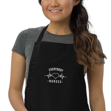 Load image into Gallery viewer, Nursing in the Six - EVERYBODY &#39;LOVES&#39; NURSES - Embroidered Apron - BLACK
