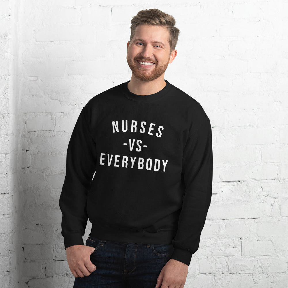 Nursing in the Six - NURSES VS. EVERYBODY - Unisex - Crew Neck Sweatshirt - BLACK