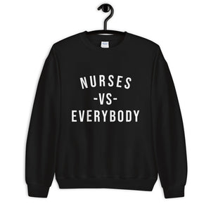 Nursing in the Six - NURSES VS. EVERYBODY - Unisex - Crew Neck Sweatshirt - BLACK